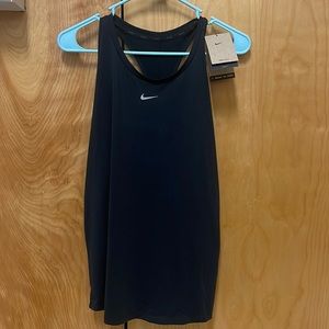 New with tags. Women’s black Nike tank top, size large.